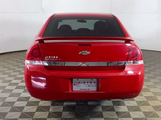 2009 Victory Red Chevrolet Impala LT FWD Sedan