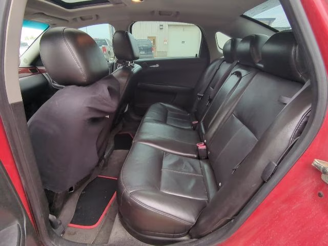 2009 Victory Red Chevrolet Impala LT FWD Sedan