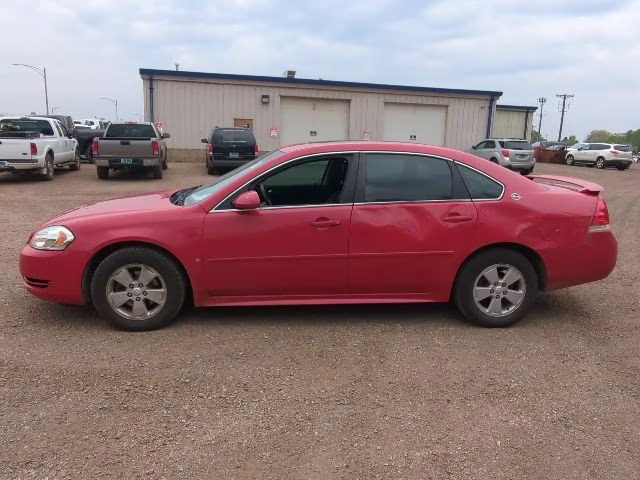 2009 Victory Red Chevrolet Impala LT FWD Sedan