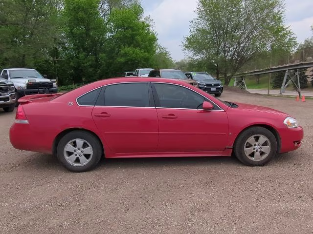 2009 Victory Red Chevrolet Impala LT FWD Sedan