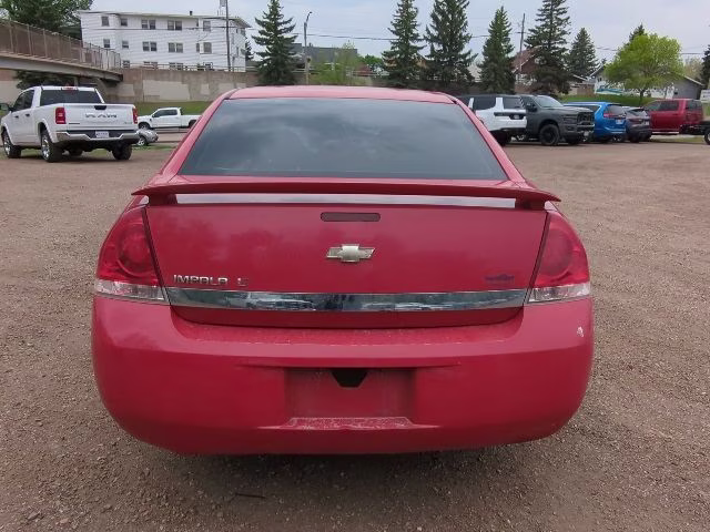 2009 Victory Red Chevrolet Impala LT FWD Sedan