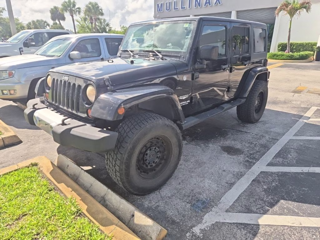 2013 Black Clearcoat Jeep Wrangler Unlimited Sahara 4X4 SUV