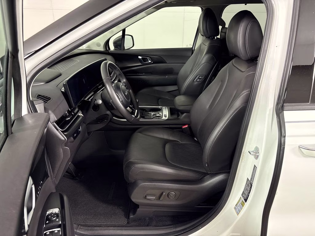 2025 Snow White Pearl Kia Carnival SX FWD Van