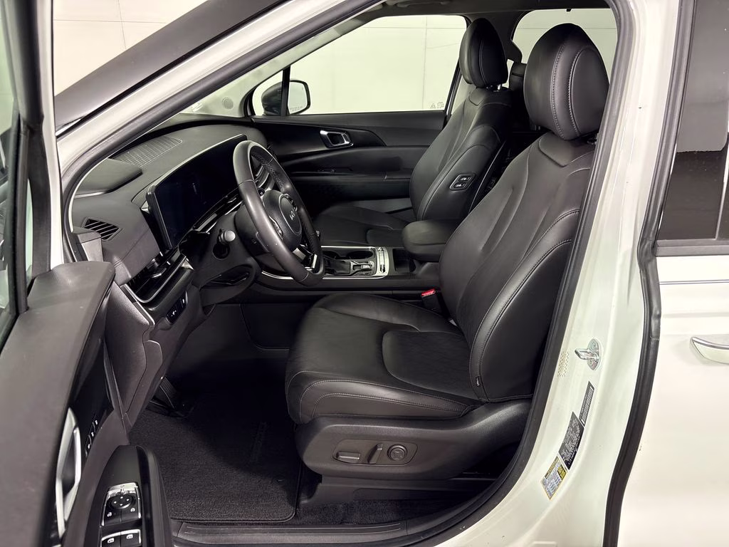 2025 Snow White Pearl Kia Carnival SX FWD Van