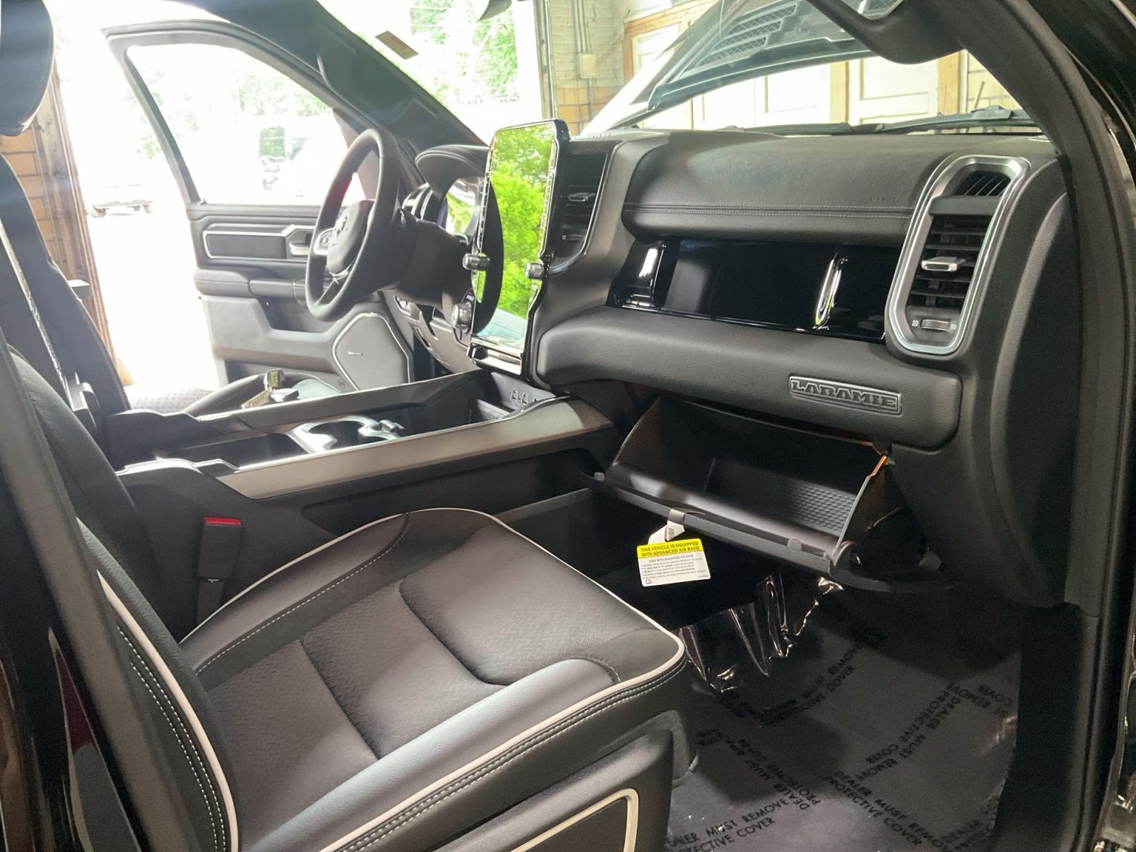 2026 Diamond Black Crystal Pearlcoat Ram 1500 Laramie 4X4 Truck