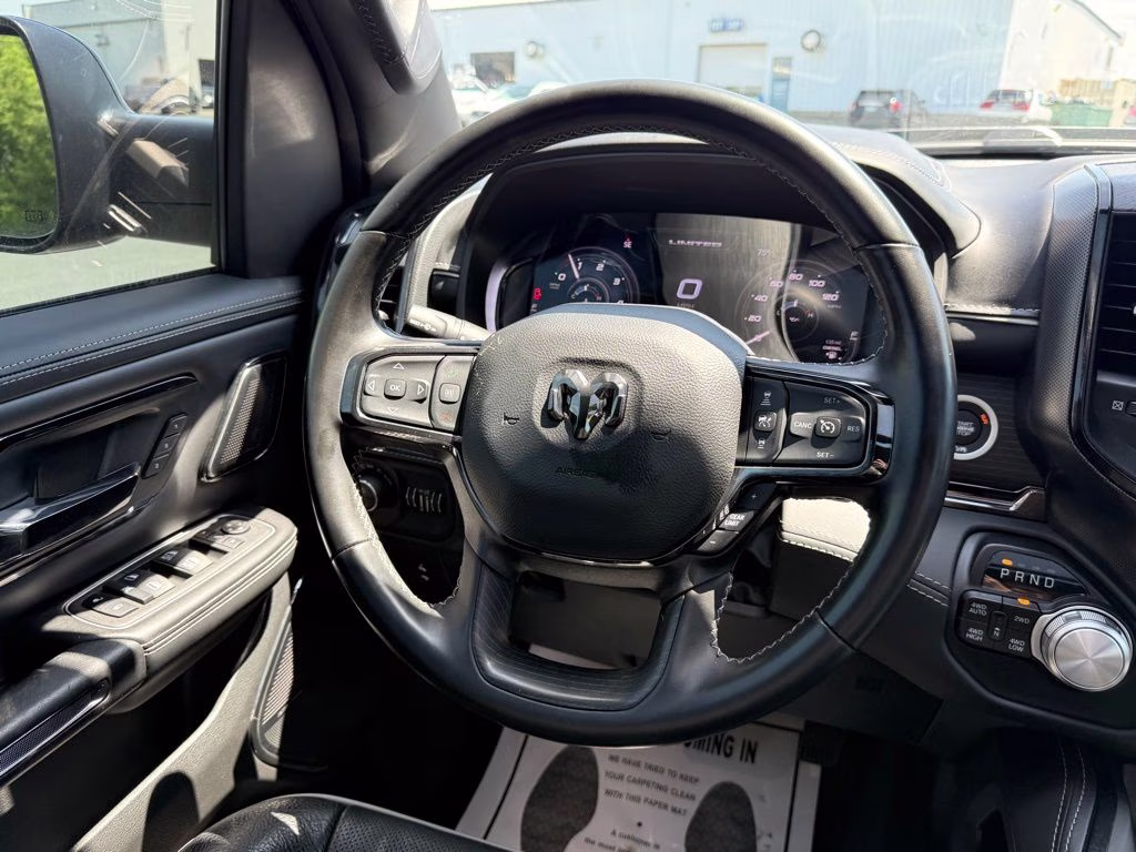 2023 Patriot Blue Pearlcoat Ram 1500 Limited 4X4 Truck
