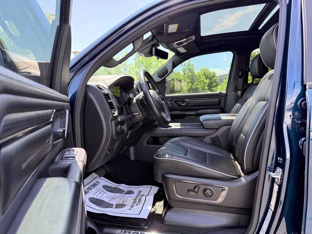 2023 Patriot Blue Pearlcoat Ram 1500 Limited 4X4 Truck