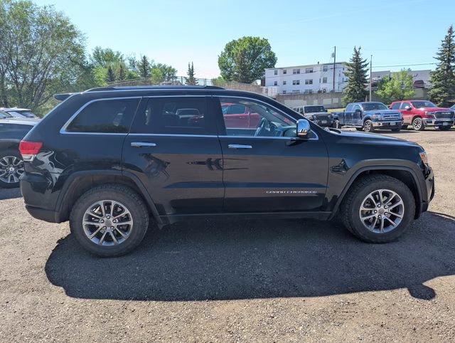 2015 Black Forest Green Pearlcoat Jeep Grand Cherokee Limited 4X4 SUV