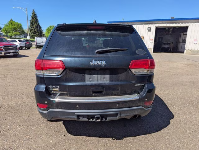 2015 Black Forest Green Pearlcoat Jeep Grand Cherokee Limited 4X4 SUV