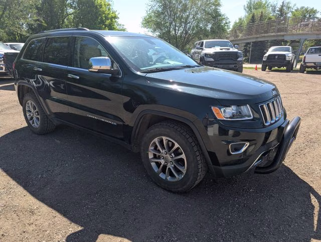 2015 Black Forest Green Pearlcoat Jeep Grand Cherokee Limited 4X4 SUV