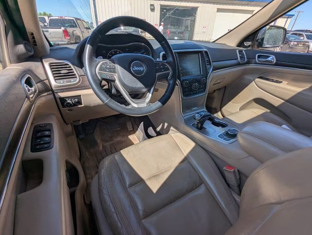 2015 Black Forest Green Pearlcoat Jeep Grand Cherokee Limited 4X4 SUV