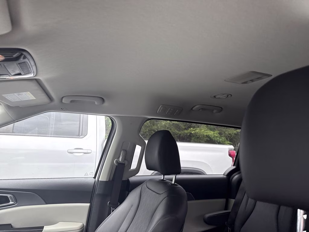 2024 Snow White Pearl Kia Carnival LX FWD Van