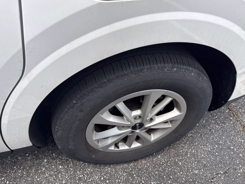 2024 Snow White Pearl Kia Carnival LX FWD Van