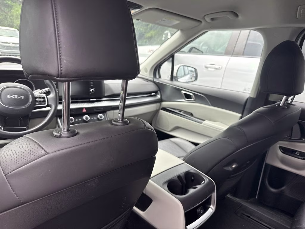 2024 Snow White Pearl Kia Carnival LX FWD Van