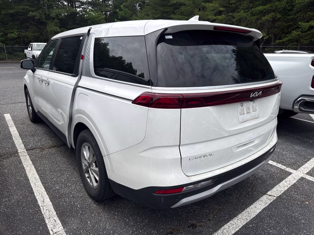 2024 Snow White Pearl Kia Carnival LX FWD Van