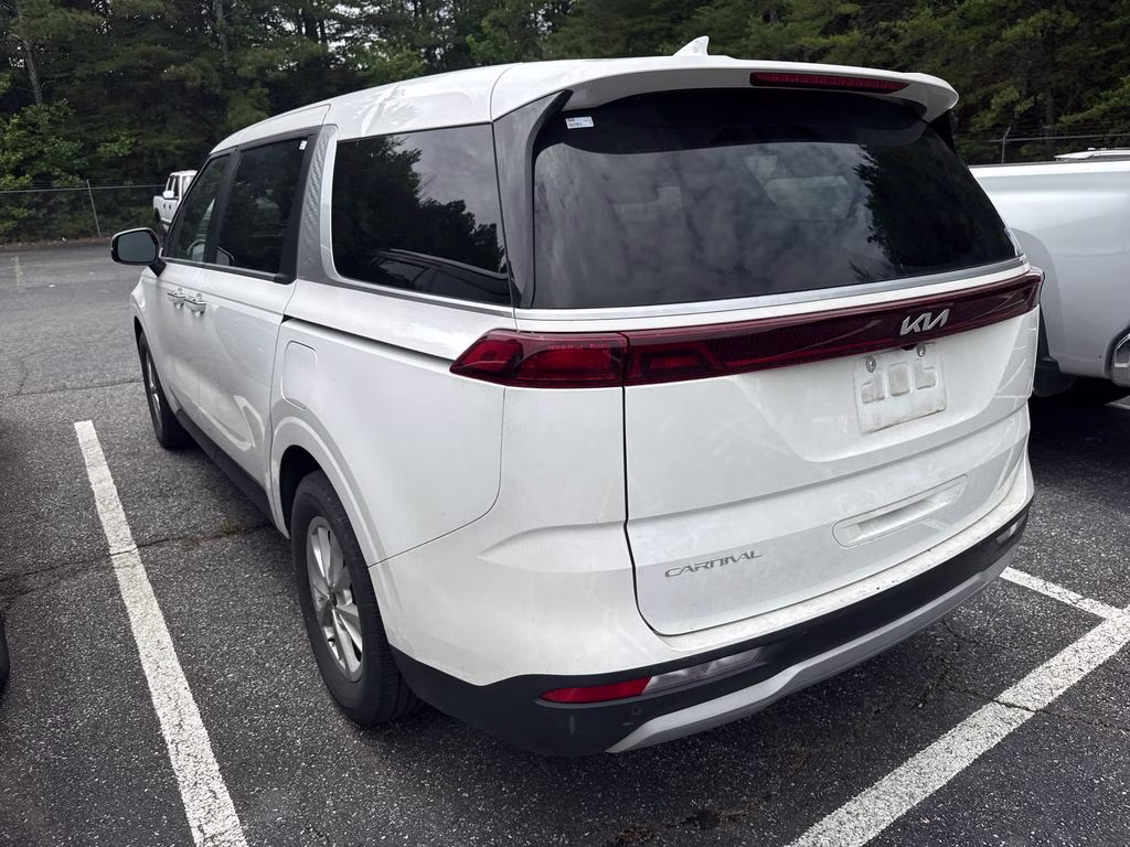 2024 Snow White Pearl Kia Carnival LX FWD Van