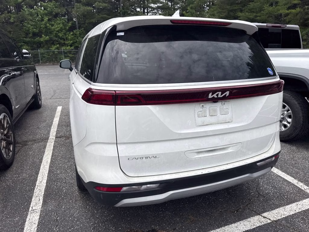 2024 Snow White Pearl Kia Carnival LX FWD Van