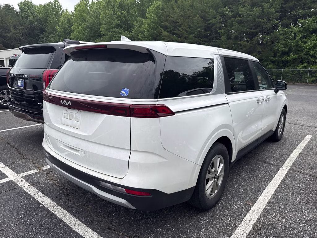 2024 Snow White Pearl Kia Carnival LX FWD Van