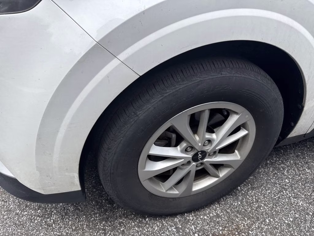 2024 Snow White Pearl Kia Carnival LX FWD Van