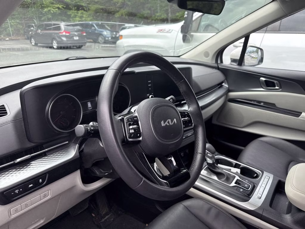 2024 Snow White Pearl Kia Carnival LX FWD Van