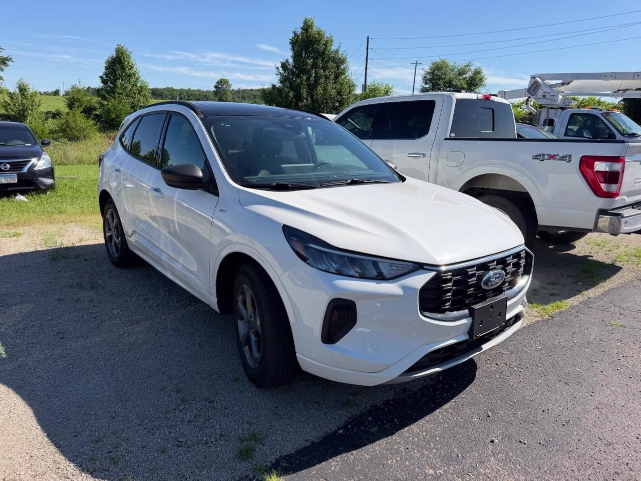 2024 Star White Metallic Tri-Coat Ford Escape ST-Line AWD SUV