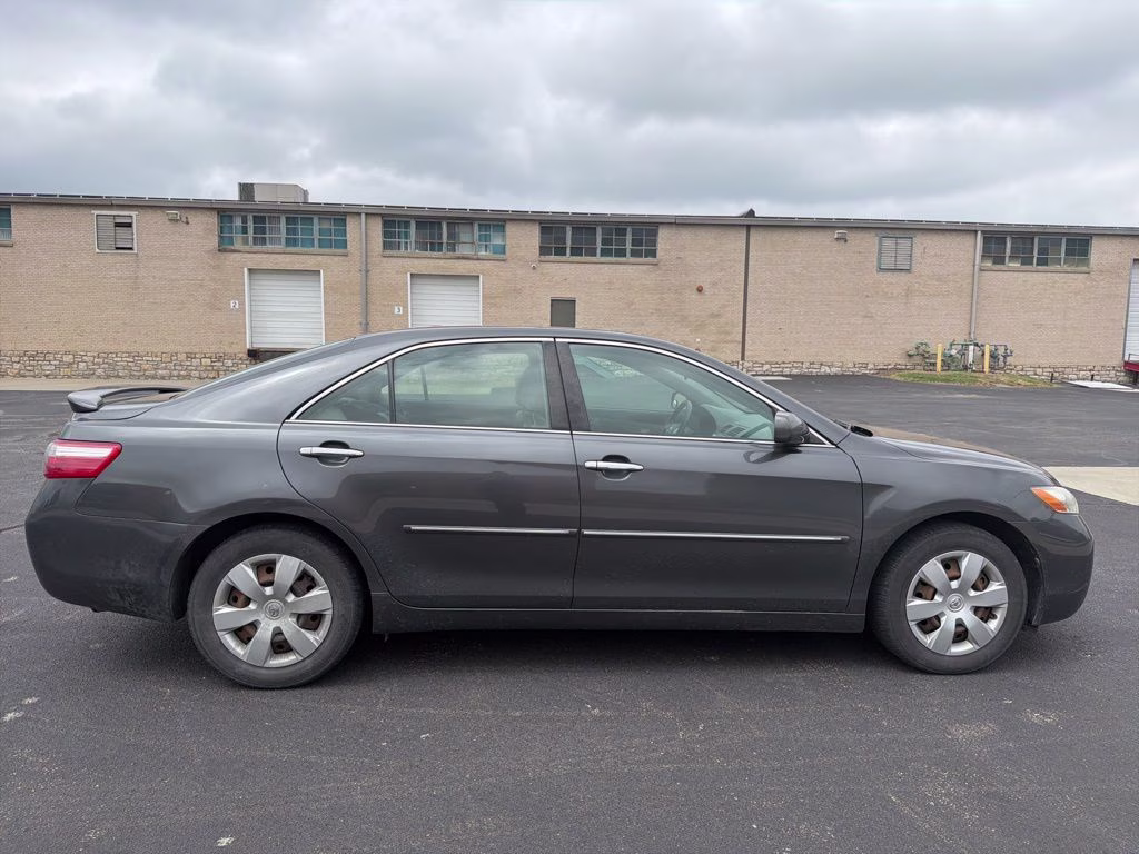2009 Magnetic Gray Metallic Toyota Camry LE FWD Sedan