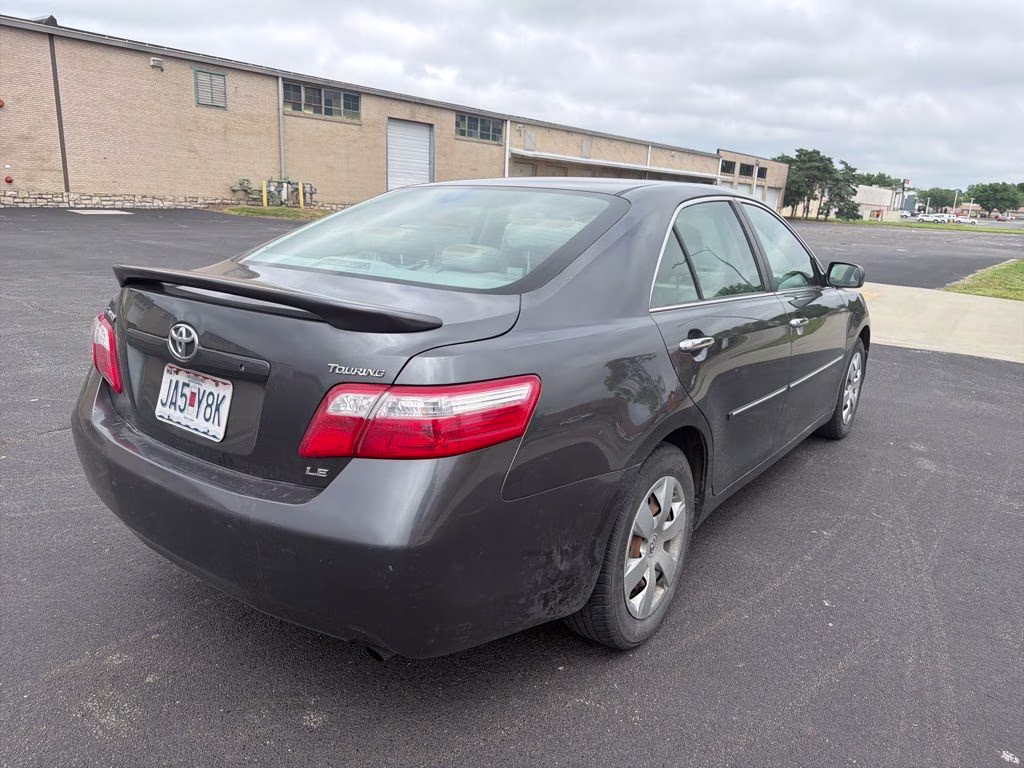 2009 Magnetic Gray Metallic Toyota Camry LE FWD Sedan