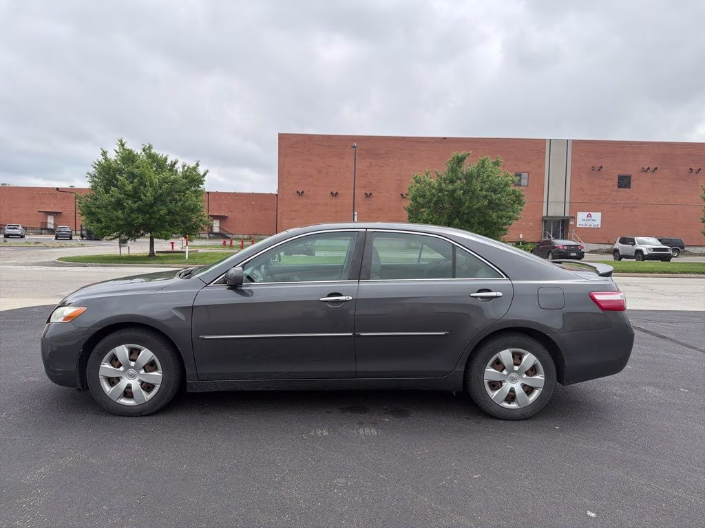 2009 Magnetic Gray Metallic Toyota Camry LE FWD Sedan