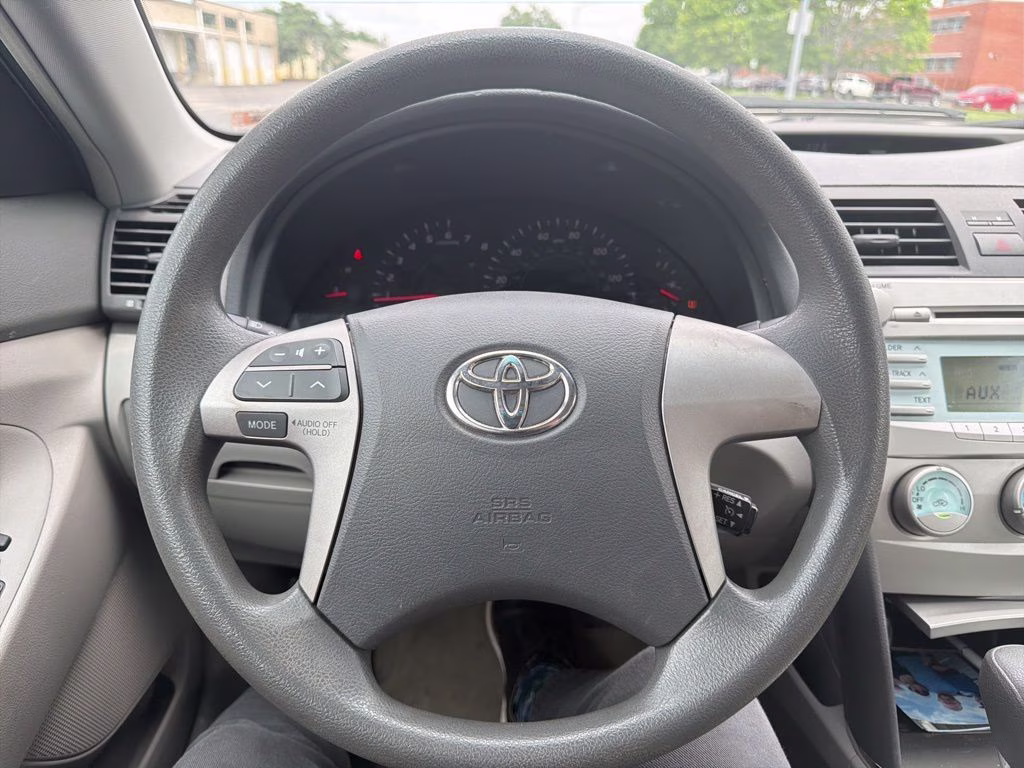 2009 Magnetic Gray Metallic Toyota Camry LE FWD Sedan