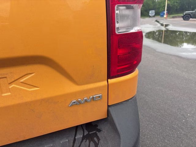 2022 Orange Ford Maverick Lariat AWD Truck