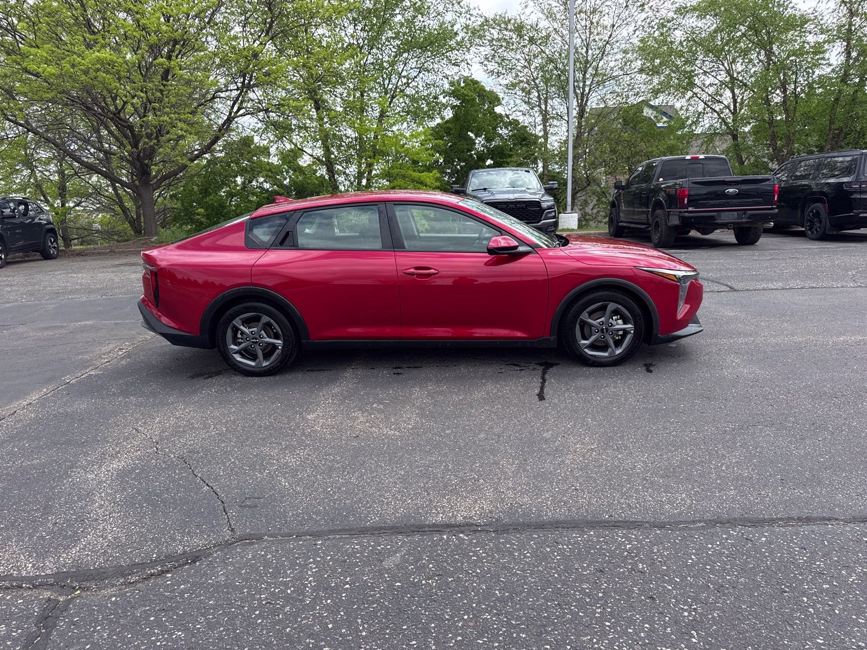 2025 Currant Red Kia K4 LXS FWD Sedan