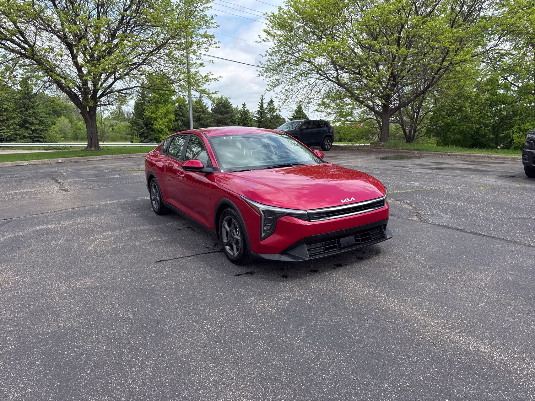 2025 Currant Red Kia K4 LXS FWD Sedan