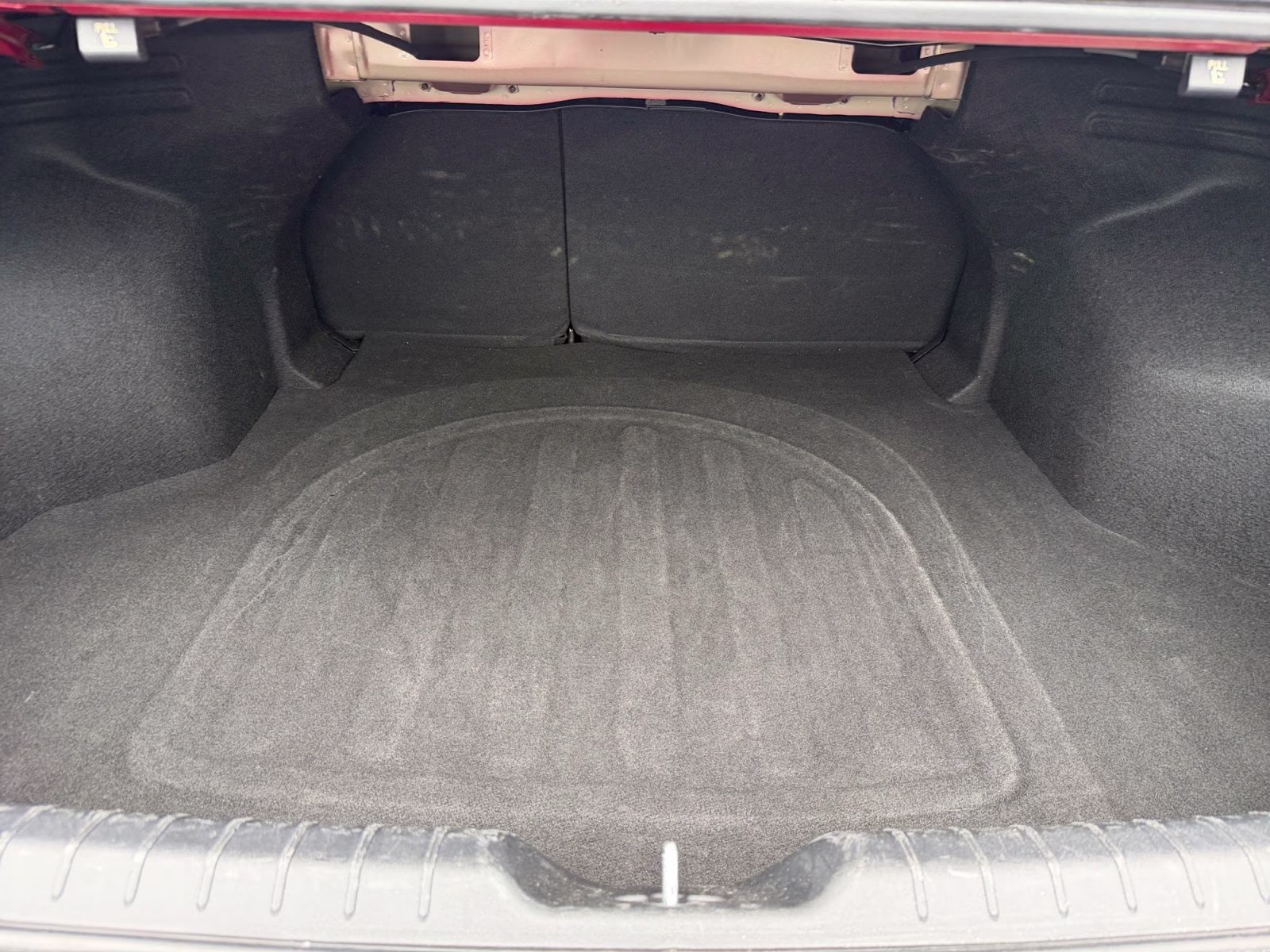 2025 Currant Red Kia K4 LXS FWD Sedan