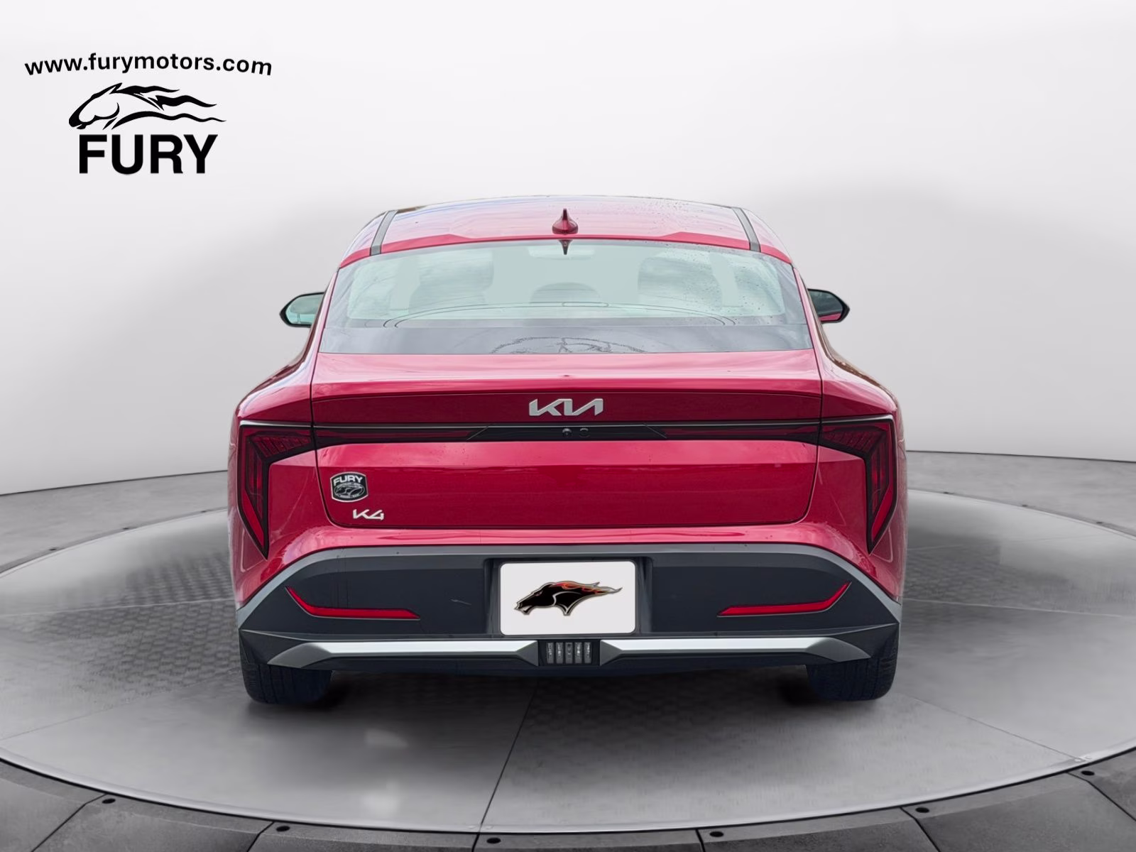 2025 Currant Red Kia K4 LXS FWD Sedan