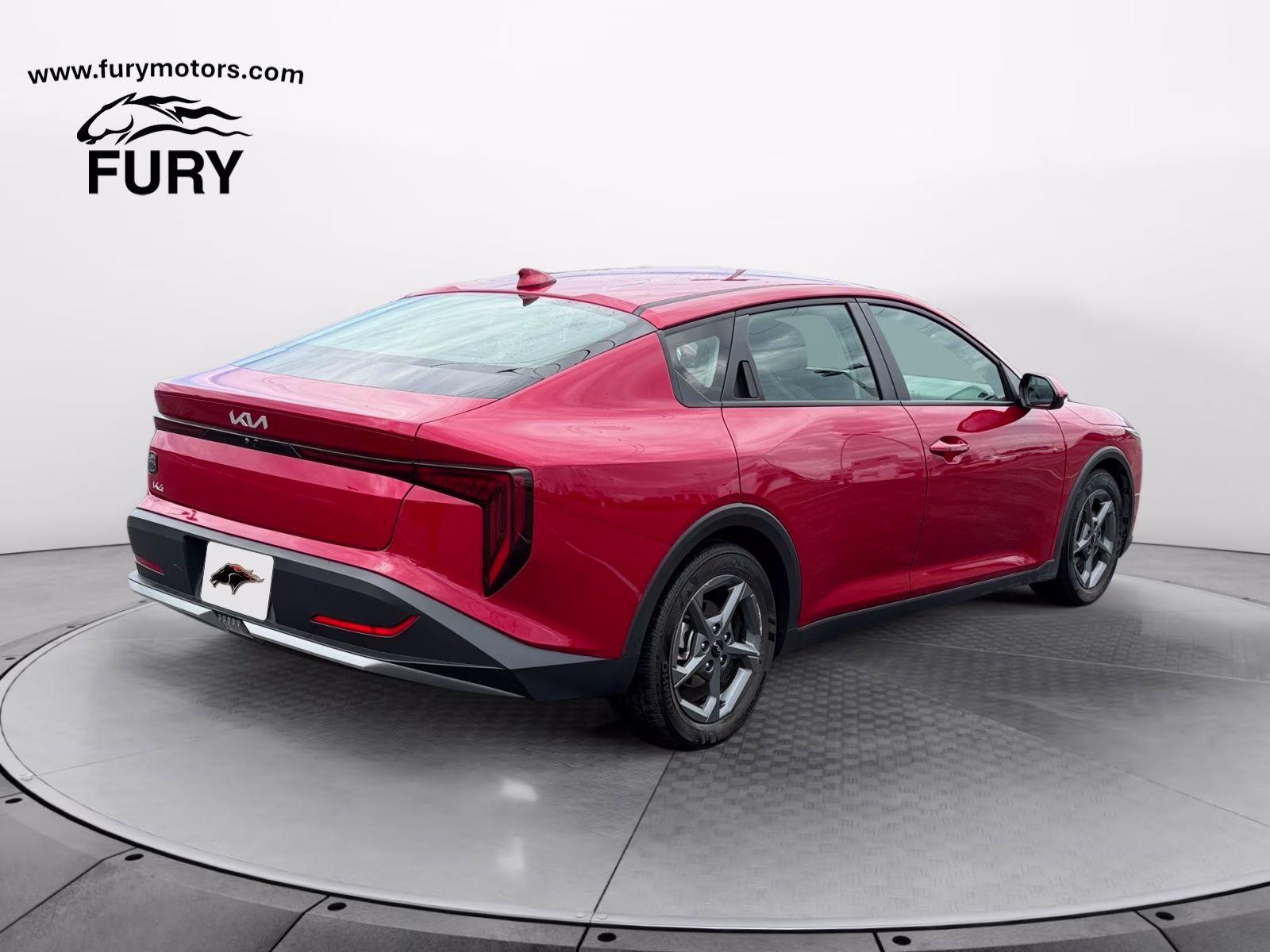 2025 Currant Red Kia K4 LXS FWD Sedan