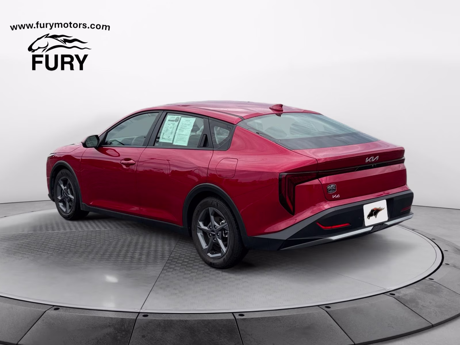 2025 Currant Red Kia K4 LXS FWD Sedan