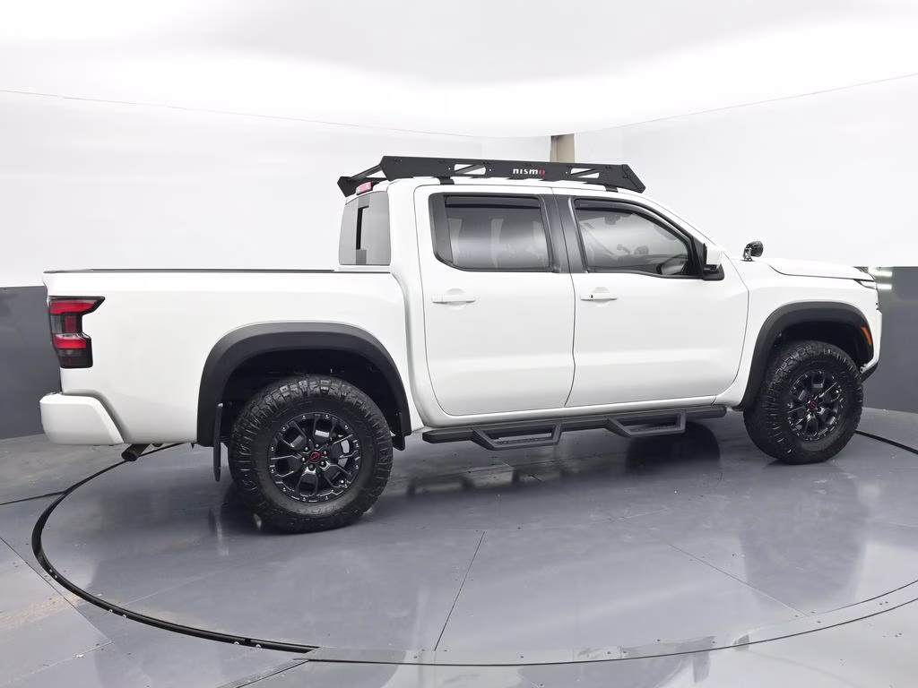 2023 Glacier White Nissan Frontier PRO-4X 4X4 Truck