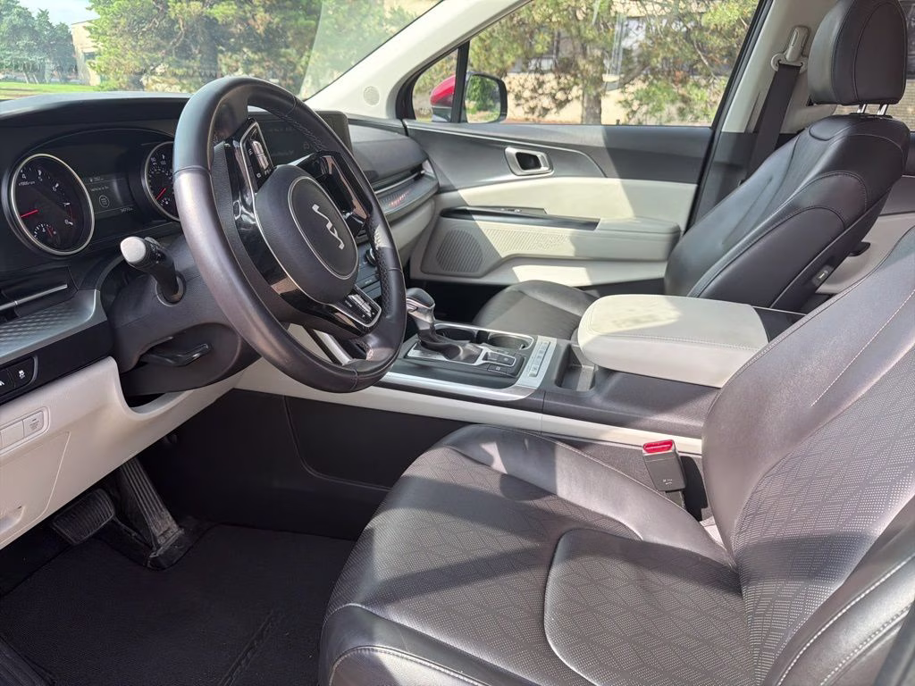 2024 Flare Red Kia Carnival LX FWD Van