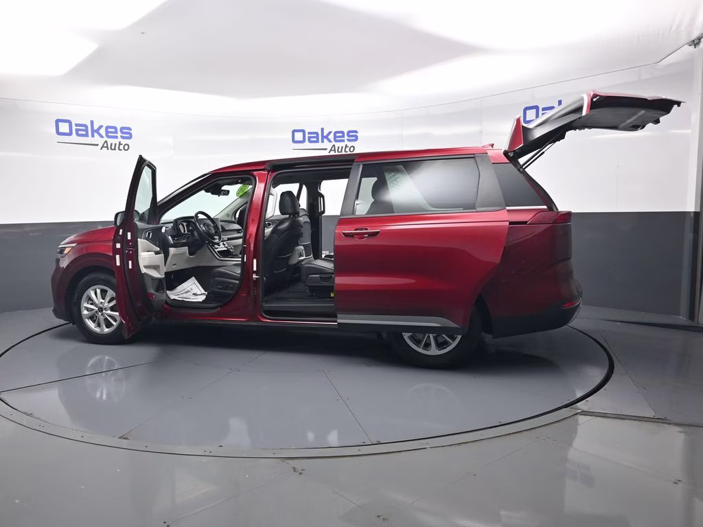 2024 Flare Red Kia Carnival LX FWD Van