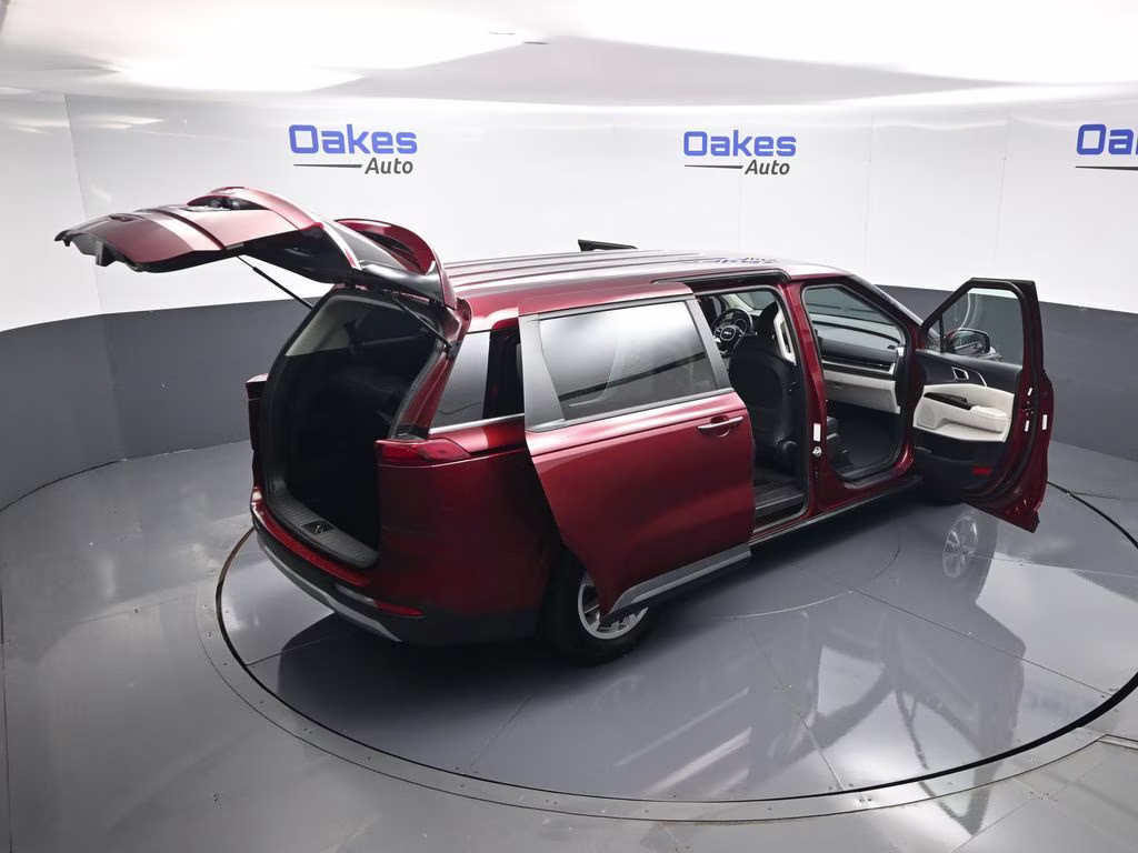 2024 Flare Red Kia Carnival LX FWD Van