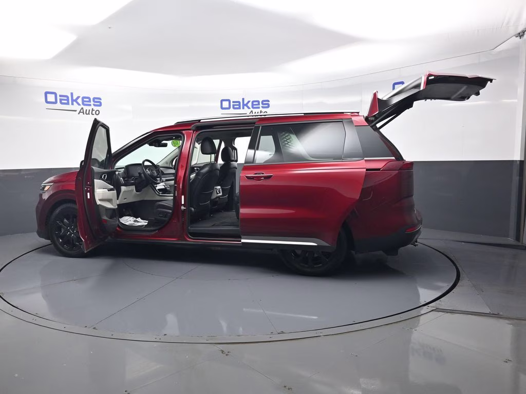 2023 Flare Red Kia Carnival SX Prestige FWD Van