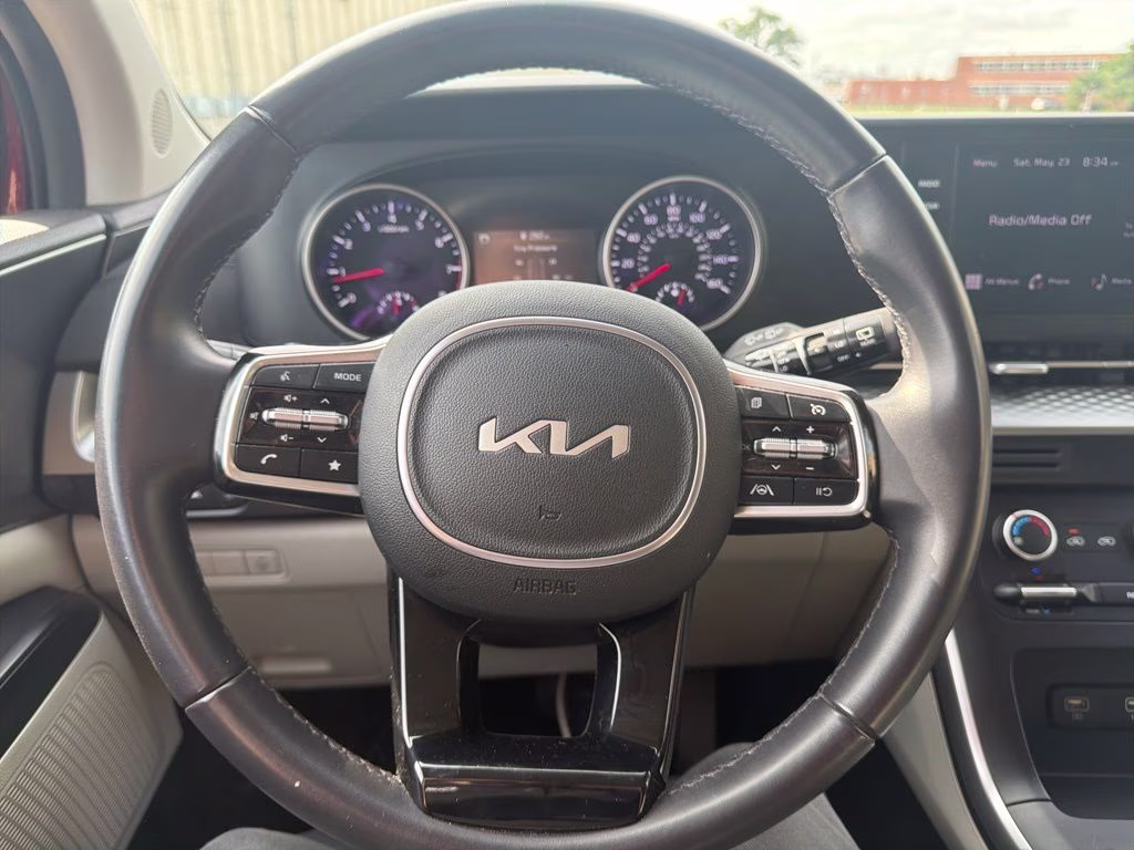 2024 Flare Red Kia Carnival LX FWD Van