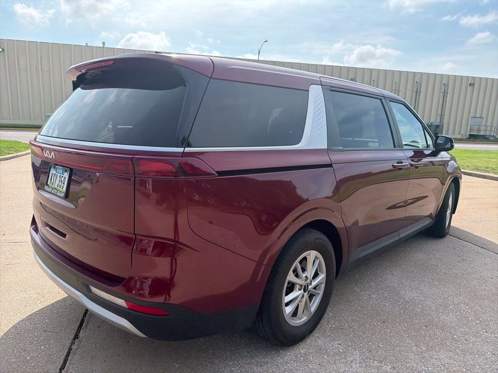 2024 Flare Red Kia Carnival LX FWD Van