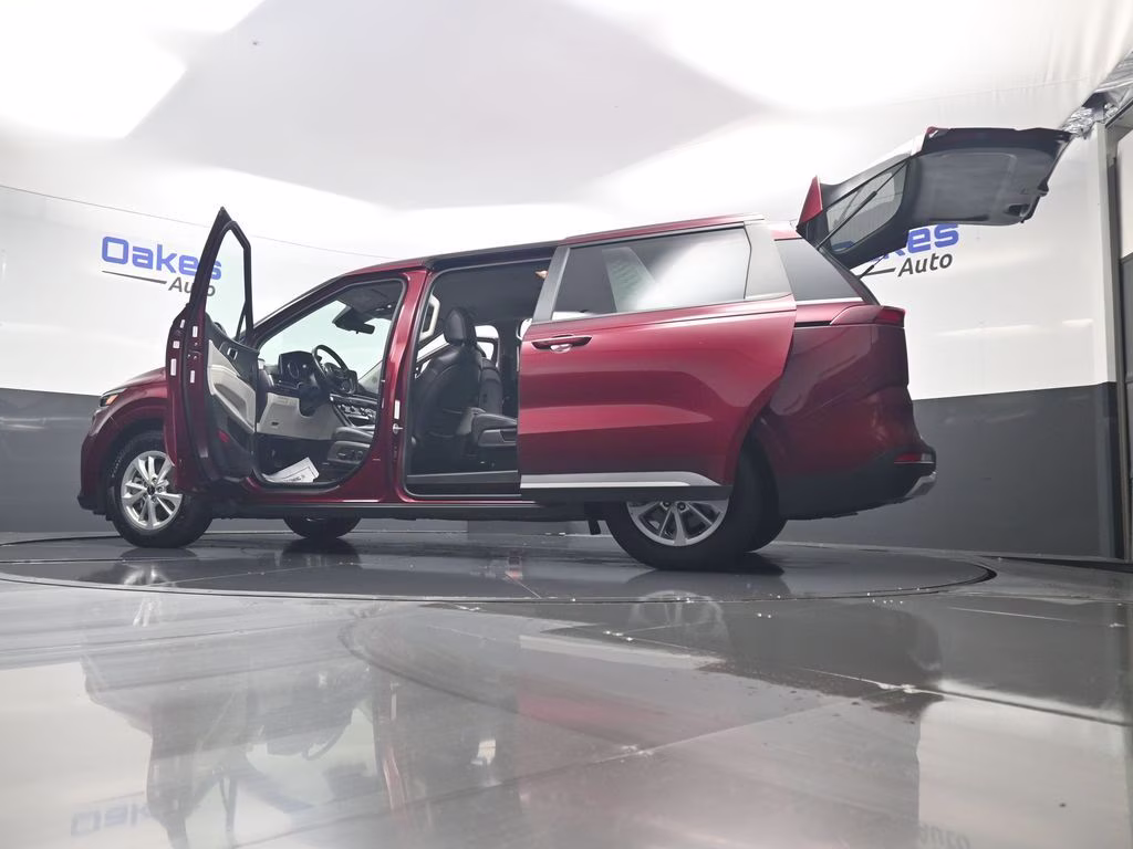 2024 Flare Red Kia Carnival LX FWD Van