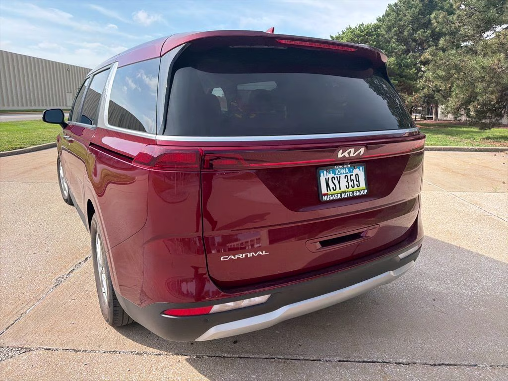 2024 Flare Red Kia Carnival LX FWD Van