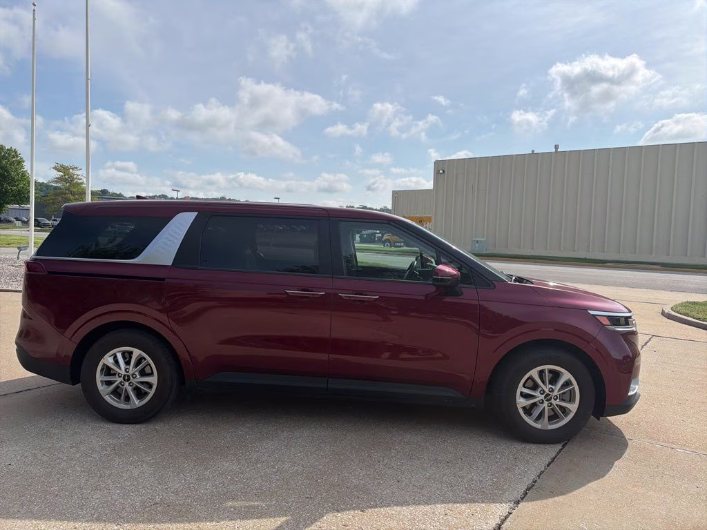 2024 Flare Red Kia Carnival LX FWD Van