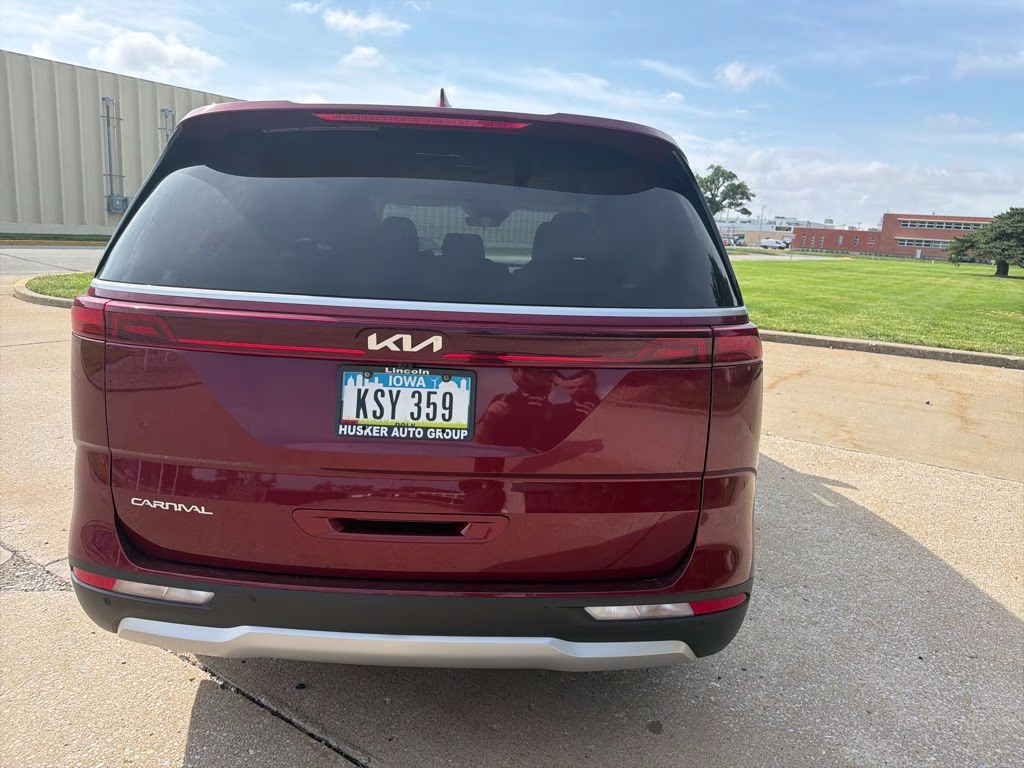 2024 Flare Red Kia Carnival LX FWD Van