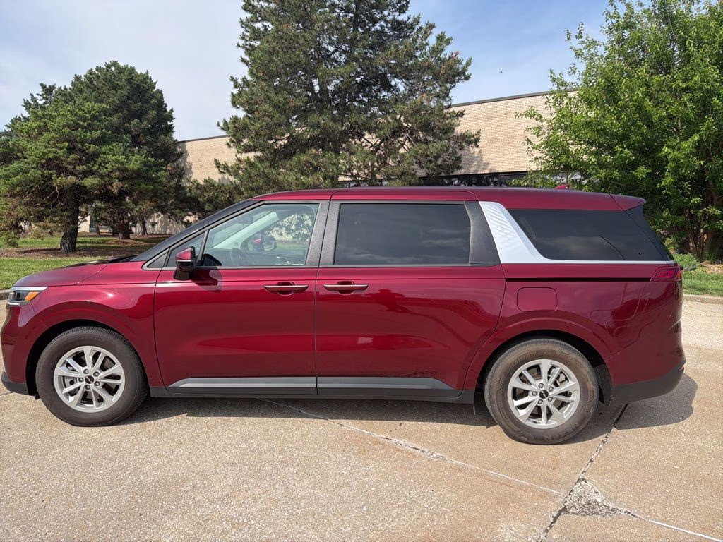 2024 Flare Red Kia Carnival LX FWD Van