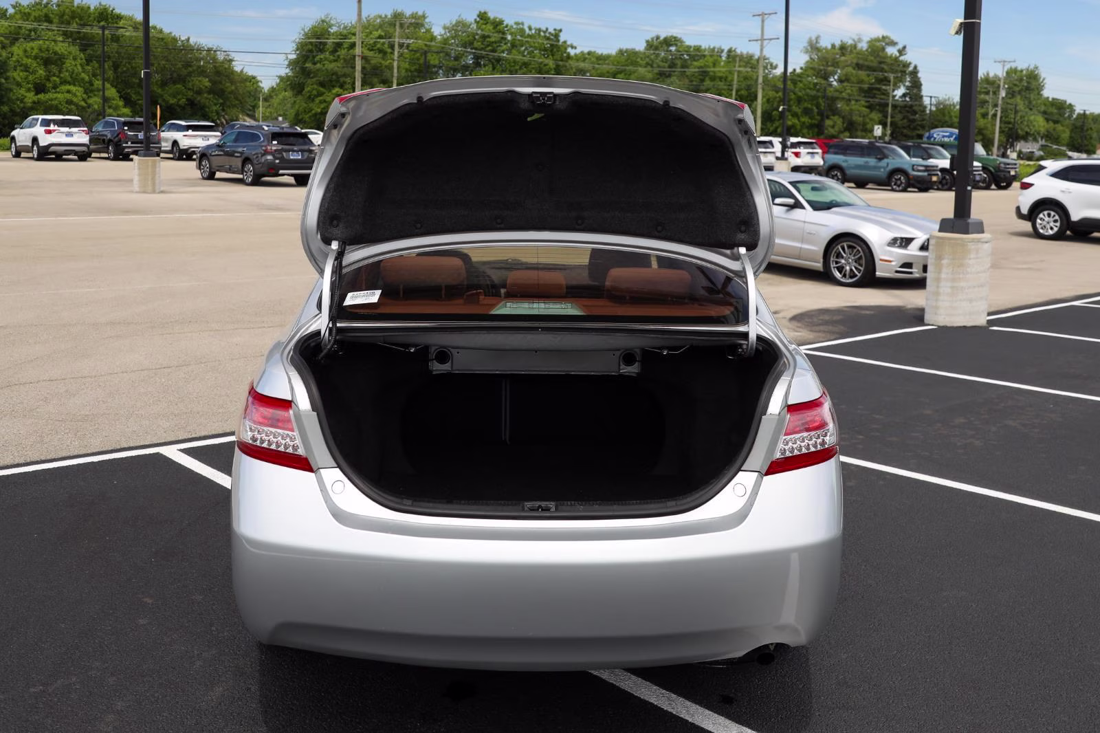 2010 Classic Silver Metallic Toyota Camry LE FWD Sedan