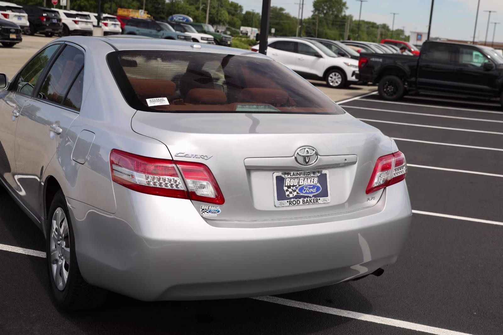 2010 Classic Silver Metallic Toyota Camry LE FWD Sedan